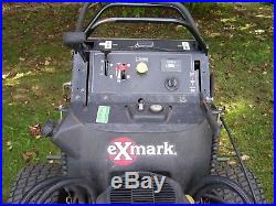 2010 Exmark Commercial Stand On Zero Turn Rider, 52 Cutting Deck 24hp