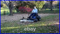 Swinging Tool Bar and Rake with tall Leaf Pushers mounts on a zero turn mower