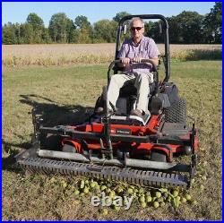 Swinging Tool Bar and Rake with tall Leaf Pushers mounts on a zero turn mower