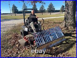 Swinging Tool Bar and Rake with tall Leaf Pushers mounts on a zero turn mower