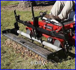 Swinging Tool Bar and Rake with tall Leaf Pushers mounts on a zero turn mower