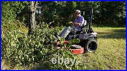 Swinging Tool Bar and Rake with tall Leaf Pushers mounts on a zero turn mower